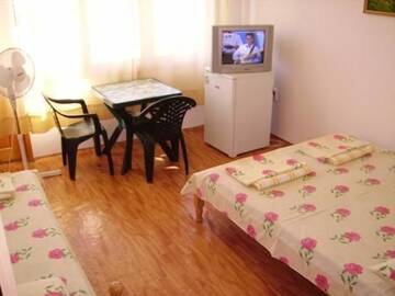 Фото номера Двухместный номер с 1 кроватью Гостевой дом "Agatopolis" г. Ахтопол 4